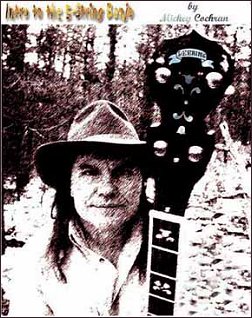Mickey Cochran with banjo, taken from the back cover of his video products.