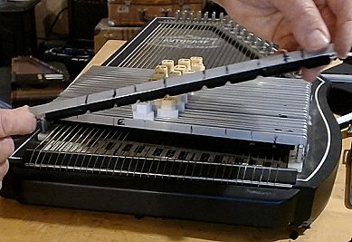 The notches for this chord bar have all been cut and it's ready to place into its slot. Click for bigger photo.