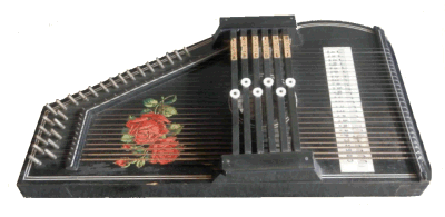 A mid-century six-chord 'Rosen' autoharp, so called because of the rose decal.  Since the Hopf family turned out thousands just like this without their name on it, chances are it's a Hopf.  Earlier versions of the same instrument had the buttons straight across.  Click for bigger photo.