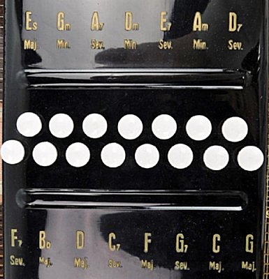The chord arrangement of the 15-chord Musima pushbutton 'ChordHarp.'  Click for bigger photo.