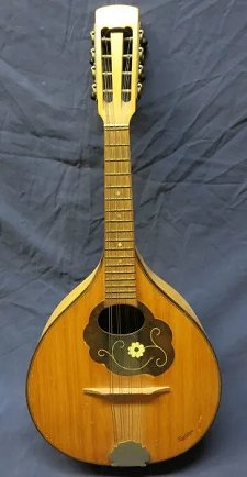 A typical mid-century dome-back mandolin, almost certainly made in Markneukirken, Germany between 1920 and 1950.  Click for a slightly bigger photo.