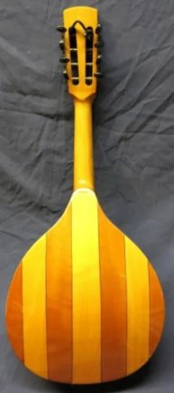 A typical mid-century dome-back mandolin, almost certainly made in Markneukirken, Germany between 1920 and 1950.  Click for a slightly bigger photo.