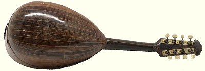 This mandolin from about 1900 represents that class of mandolins that were first standardized by the mid-1800s and became quite popular by the end of that century.  Click for bigger photo.