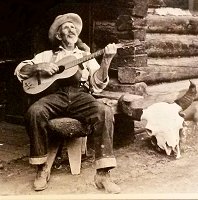 A guitar player photographed in the Black Hills some years ago. Click for bigger photo.