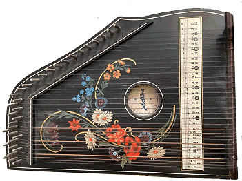 This 3-chord Jubeltone shares most features with the Musima-branded zithers above, including the wildflower design. Click for bigger photo.