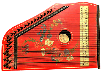 The red 3-chord Jubeltone was is often posited as a 'child's' instrument, but it has the same features as the black one to the left.  Click for bigger photo.