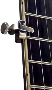 The chubb BC-25 5th String Banjo Capo installed.  Click to see on Amazon